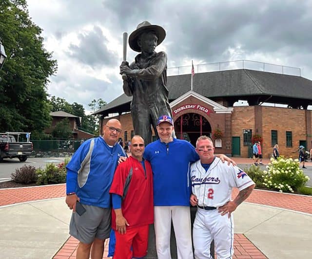 group photo in front of Abner Doubleday statue